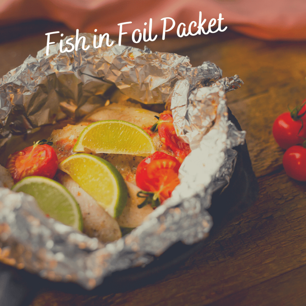 Camping meals fish in foil packet with vegetables